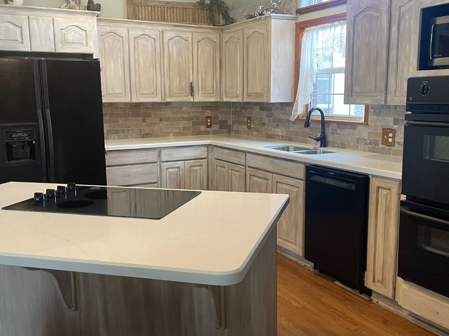 Distressed cabinetry in an El Campo, TX kitchen